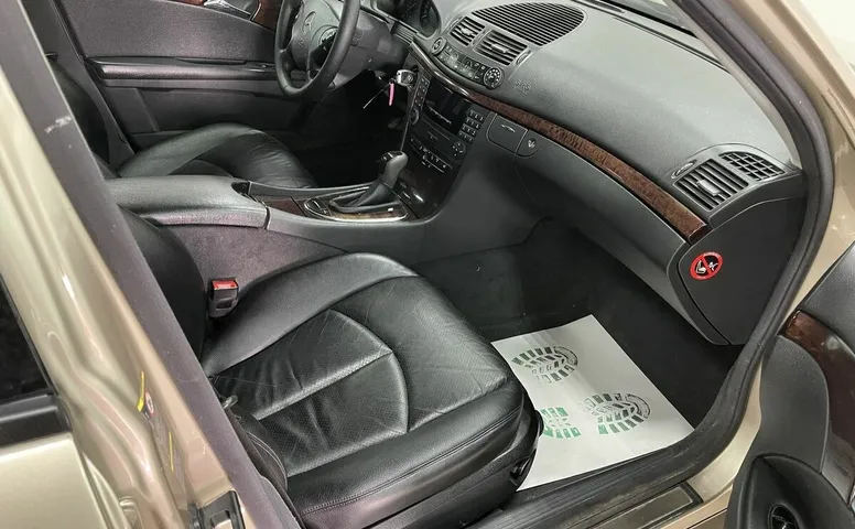 Mercedes-Benz E_KLASSE 200 1.8 AT (163 л.с.)