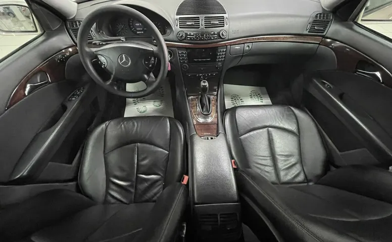 Mercedes-Benz E_KLASSE 200 1.8 AT (163 л.с.)